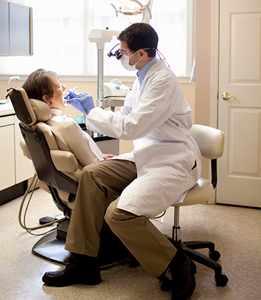Dental coverage provided as a dentist works on a patient
